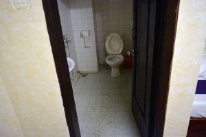 Sad bathroom in the Ha Long Happy Hostel, Ha Long City, Vietnam